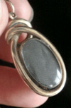 VICTORIAN 15CT HIGH CARAT LARGE CABOCHON GARNET PENDANT WITH GLASS BACK