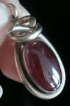 VICTORIAN 15CT HIGH CARAT LARGE CABOCHON GARNET PENDANT WITH GLASS BACK