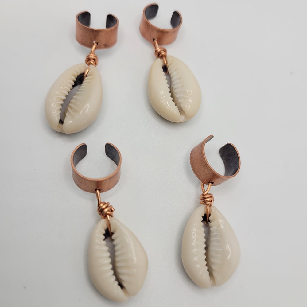Image of Cuff and cowrie shell, 3 for $12