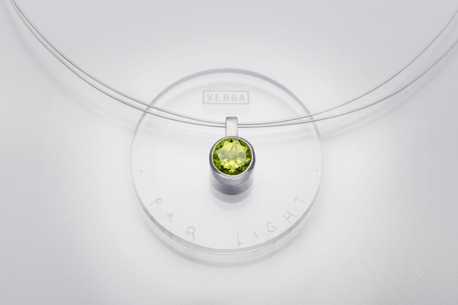 Image of "Far light" silver pendant with chrysolite  · LUMEN LUNGUM ·