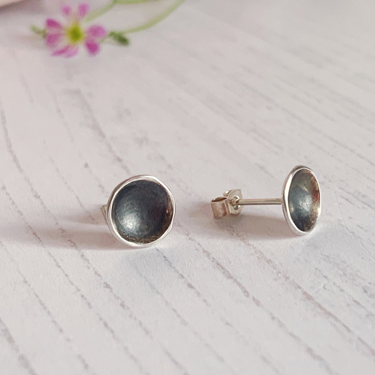 Image of Black domed stud earrings