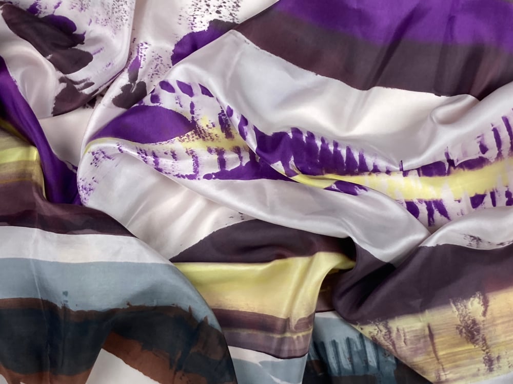 Image of Scarf silk. Brown purple grey black and one soft yellow on grey/powder.