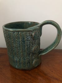 Knitted mug 