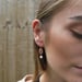 Image of Rose gold shell drop earring 