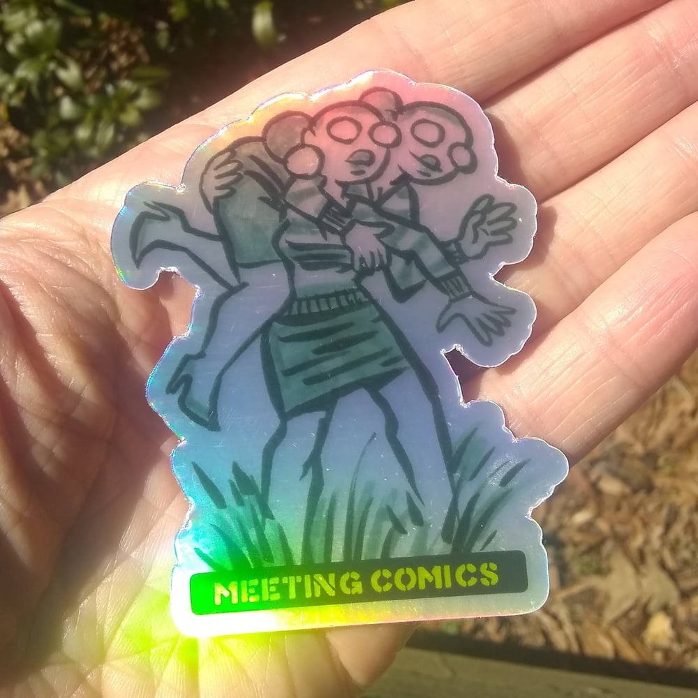 Image of Meeting Comics Uncommon Val Holofoil Sticker