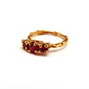 Lavish Three Stone Ring - Yellow Gold & Red Stones