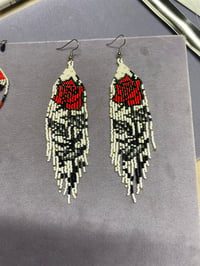 Rose earrings with dangles