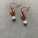 Image of Rose gold shell drop earring 