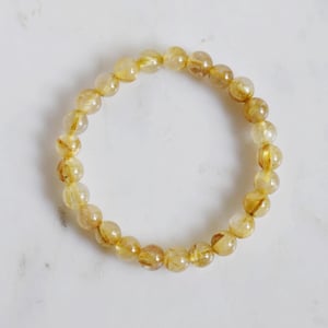Image of Golden Rutilated Quartz (Tourmalined Quartz) spheres bracelet