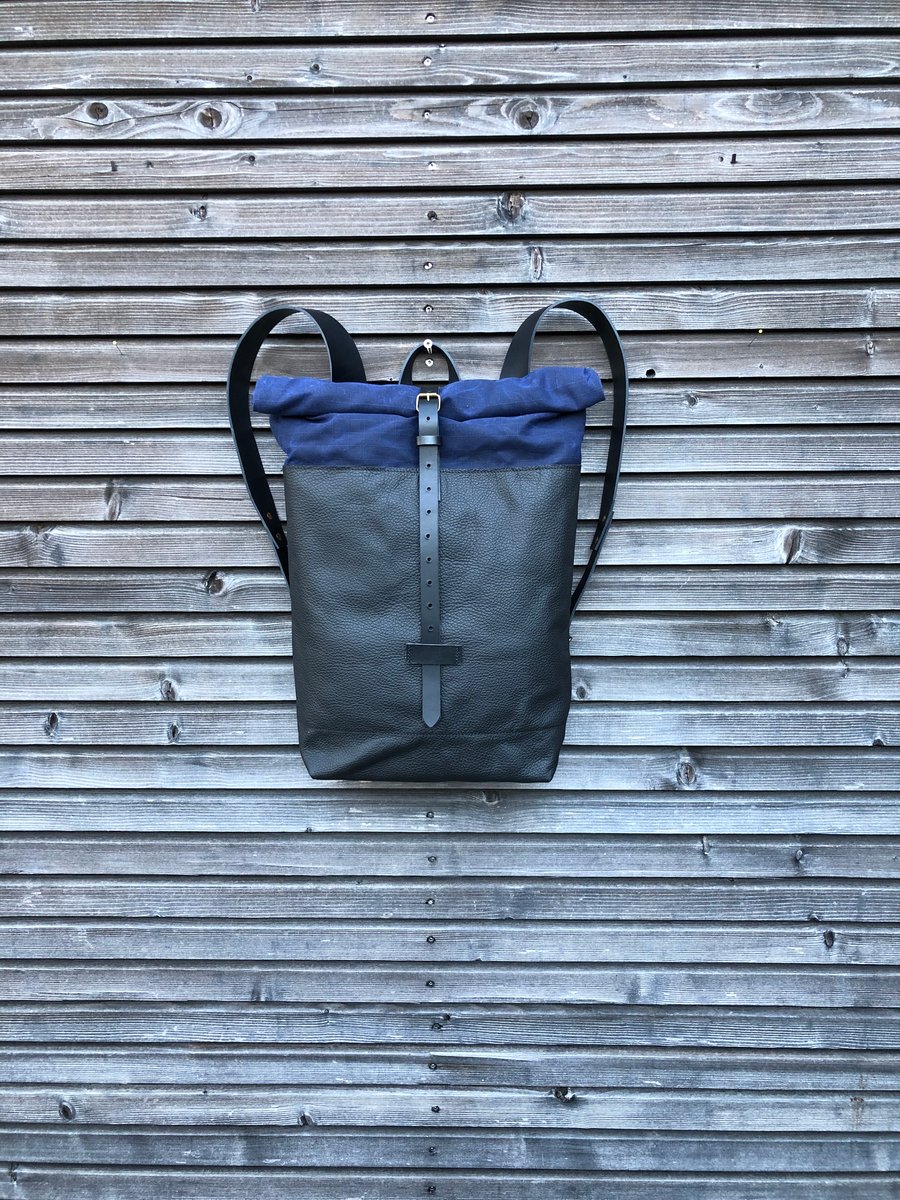 Image of Leather backpack with waxed canvas roll to close top 