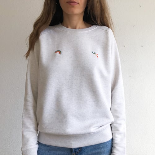 Image of Rainbow and pixels of rainbow - hand embroidered organic cotton sweatshirt, available in ALL sizes