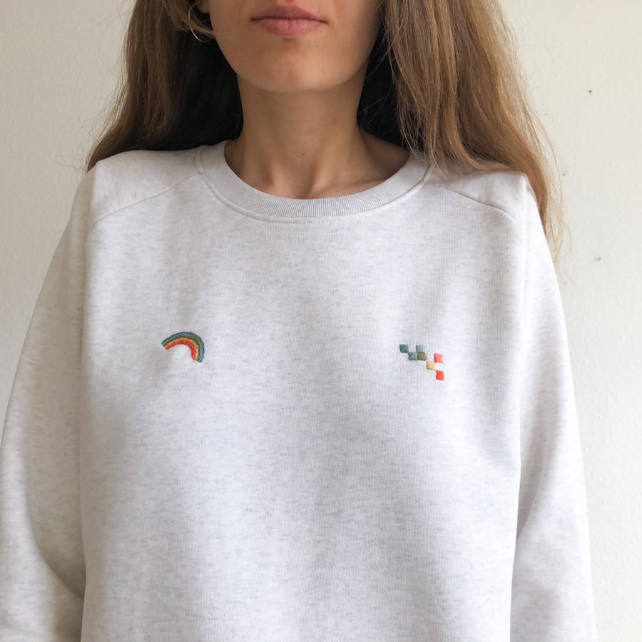 Image of Rainbow and pixels of rainbow - hand embroidered organic cotton sweatshirt, available in ALL sizes