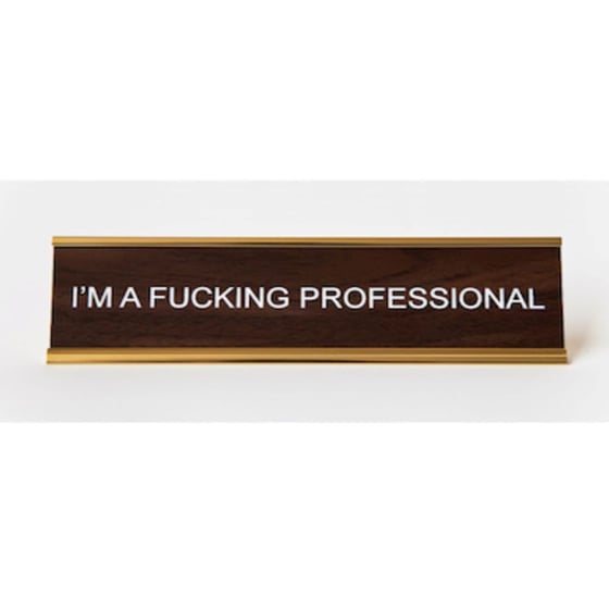 Image of I'M A FUCKING PROFESSIONAL nameplate