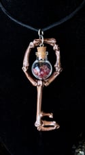 Crystal Filled, Glass Globe Charm - Bone Skeleton key Pendant. 