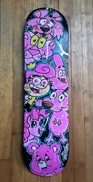 Image of 7.5 skateboard deck pink cartoon 