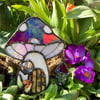 Iridescent Red and cream Mushie Cottage Suncatcher