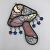 Iridescent pink catch a falling star mushroom suncatcher