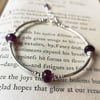 Facetted amethyst and silver bangle bracelet