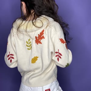 Off white cardigan with embroidered leaf detailing
