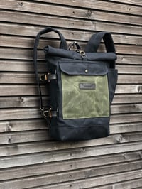 Image 1 of Waxed canvas backpack with detachable leather side straps and padded laptop compartment / padded sho