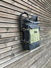 Image 5 of Waxed canvas backpack with detachable leather side straps and padded laptop compartment / padded sho