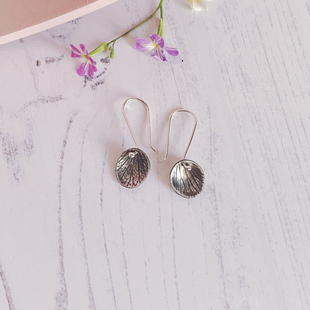 Image of Oval drop earrings with petal imprint 