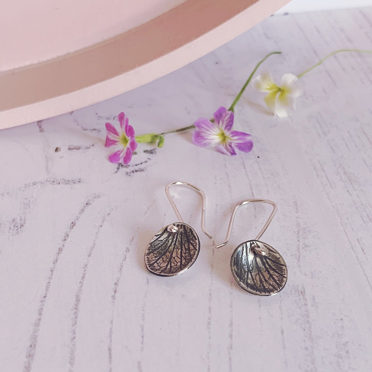 Image of Oval drop earrings with petal imprint 