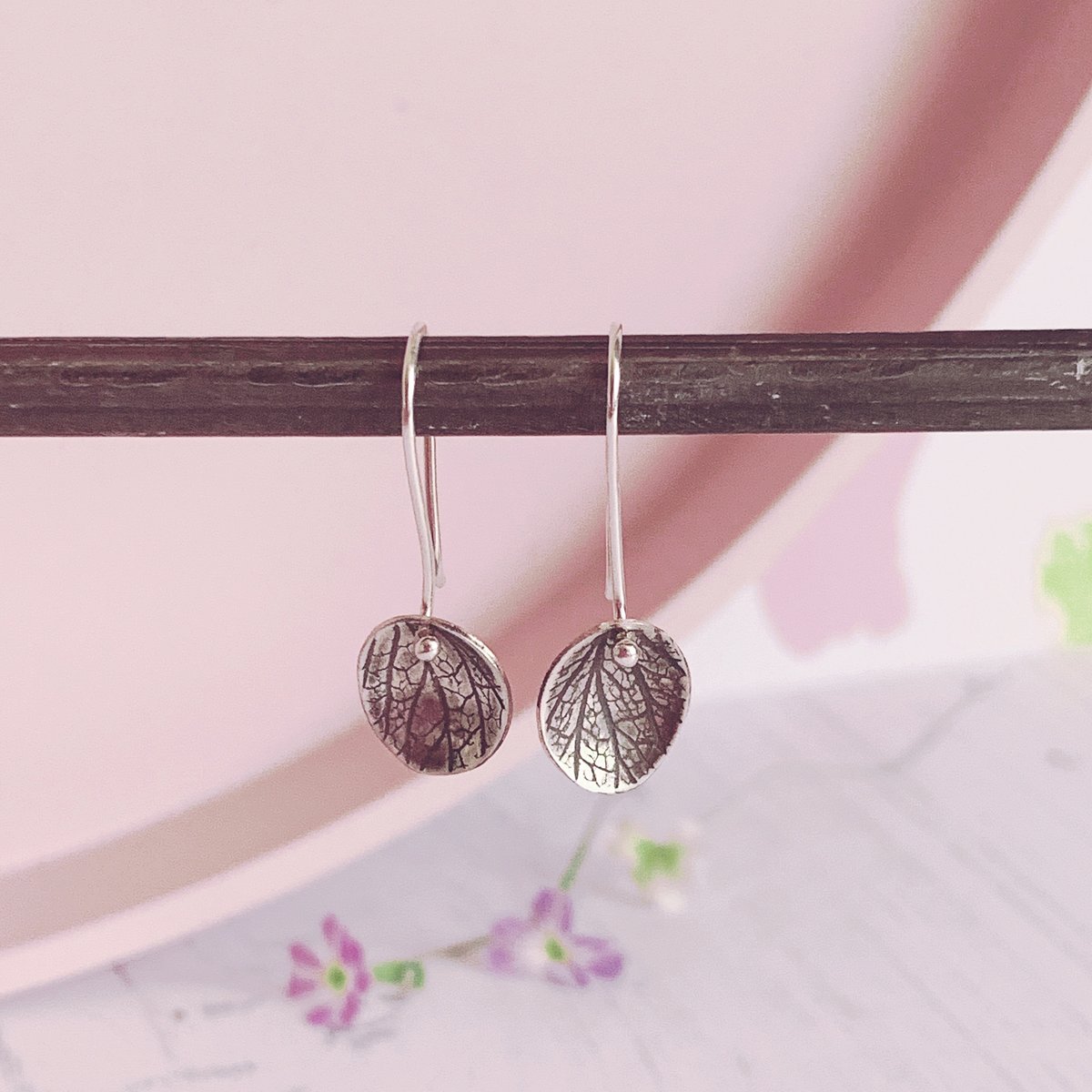 Image of Oval drop earrings with petal imprint