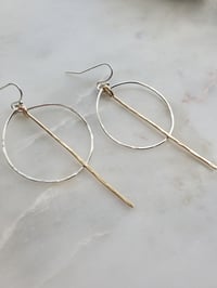 Mixed metal channel hoops