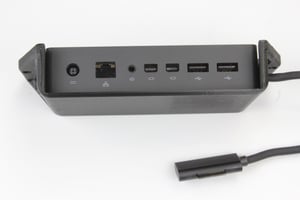 Mounting cage for Microsoft Surface Dock