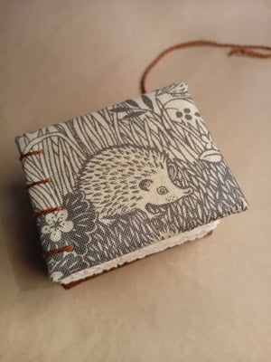 HOZAN — mini livre