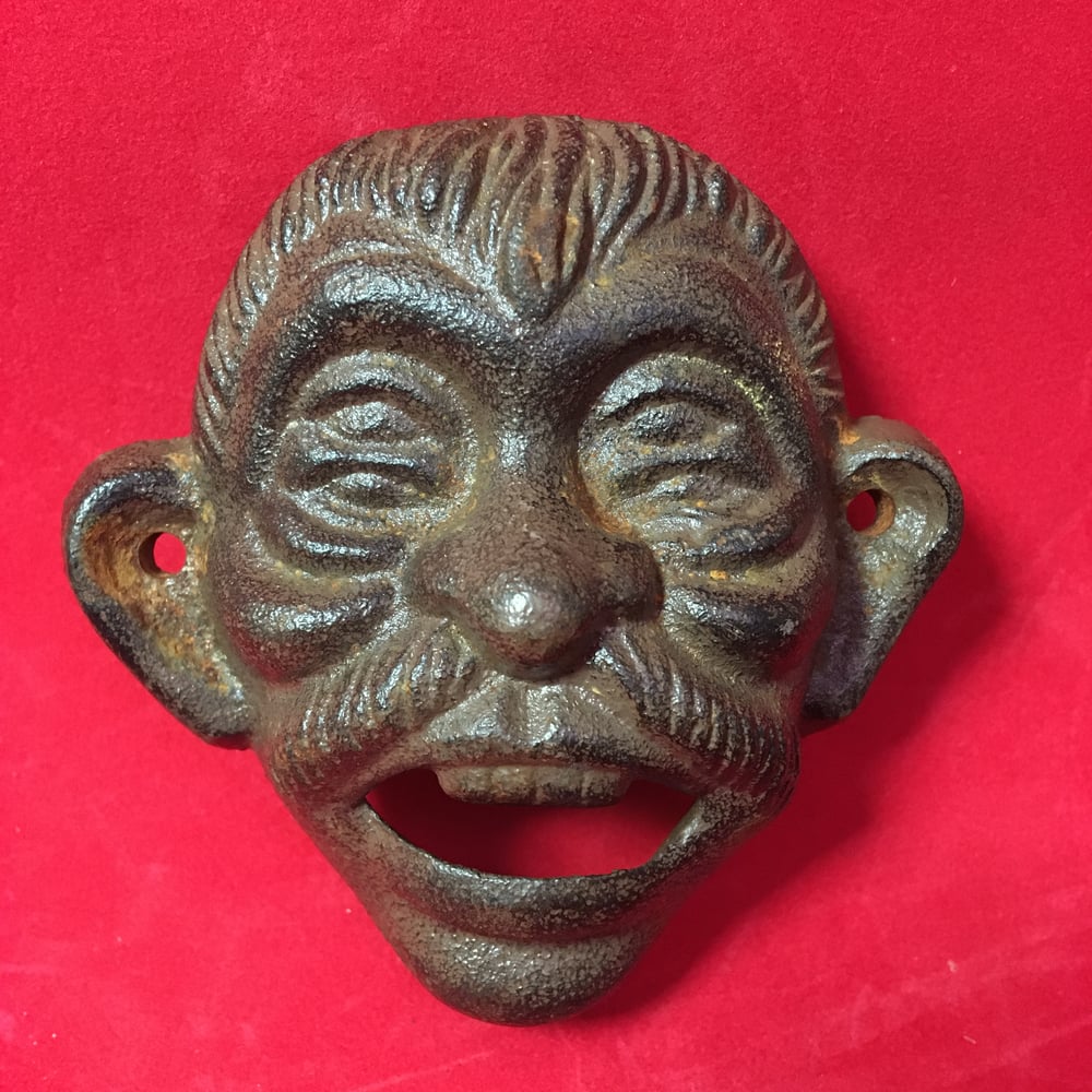 Four-Eyed Bottle Opener