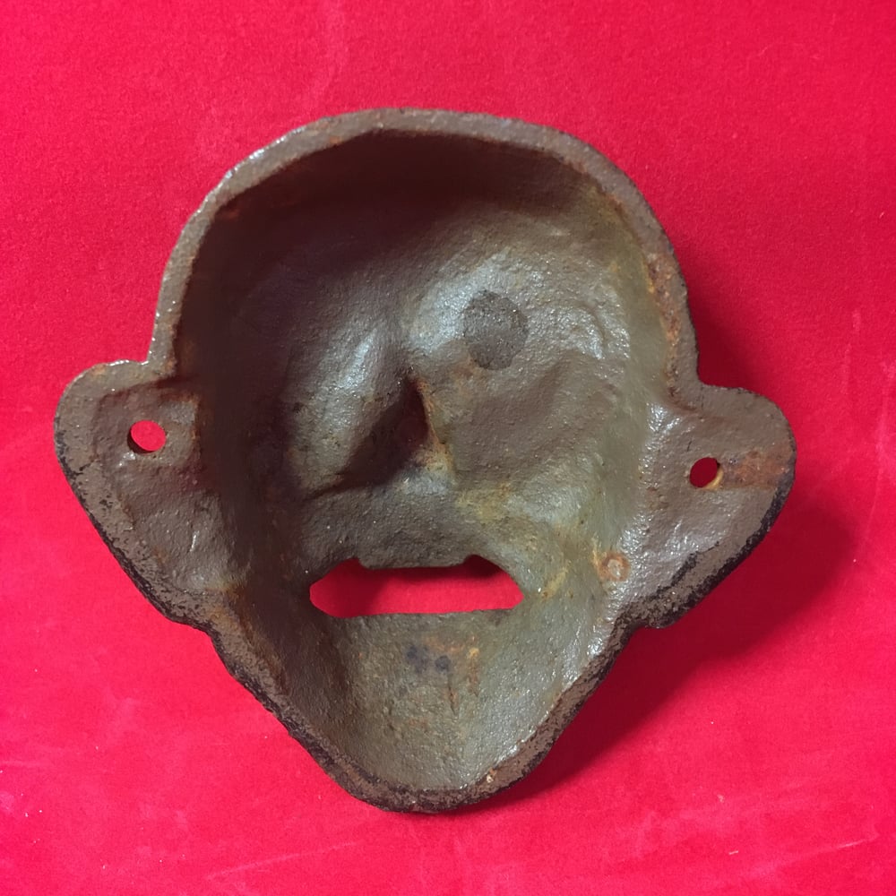Four-Eyed Bottle Opener