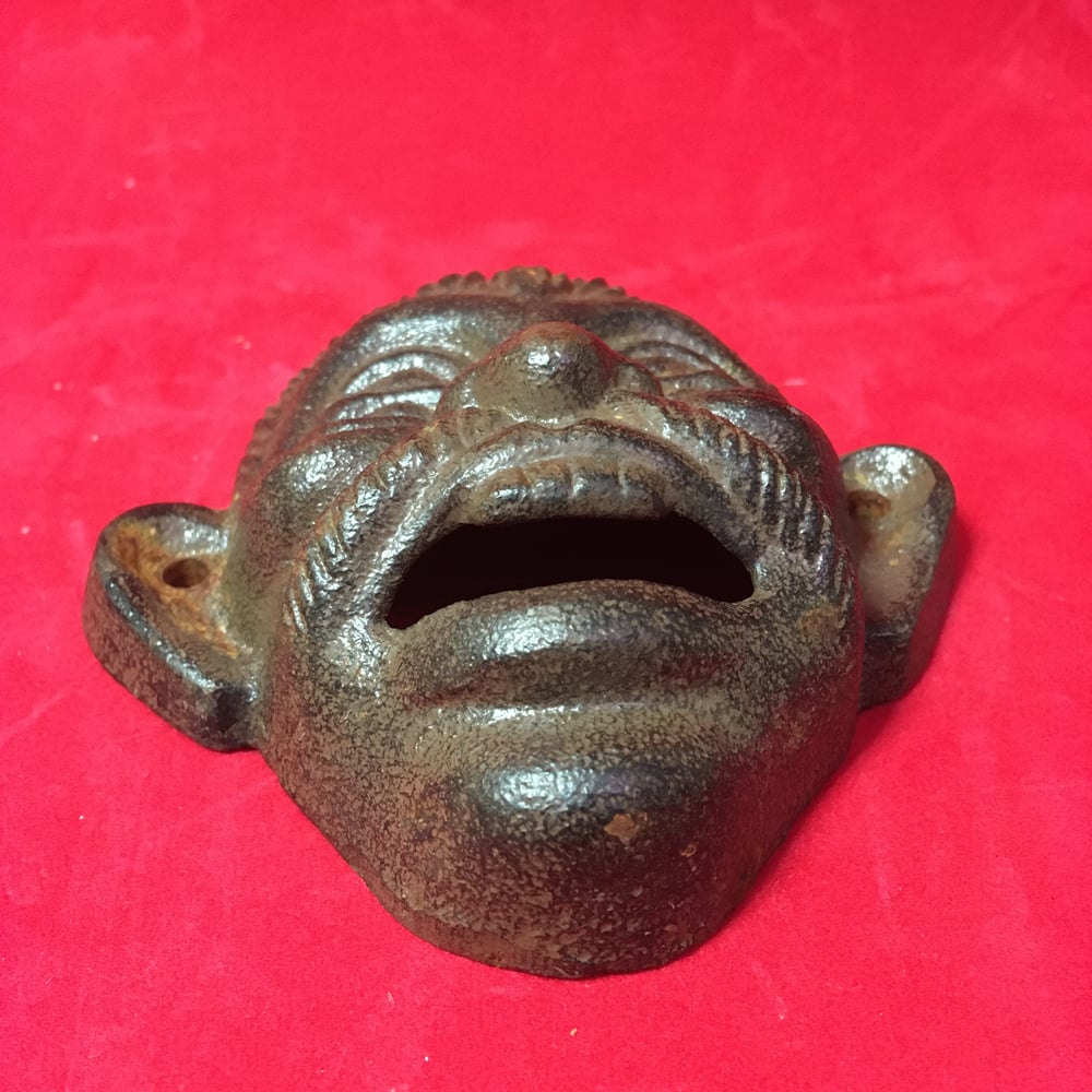 Four-Eyed Bottle Opener