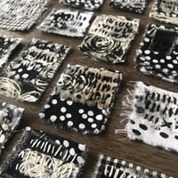 Image 1 of Stitchy tabs - black and white