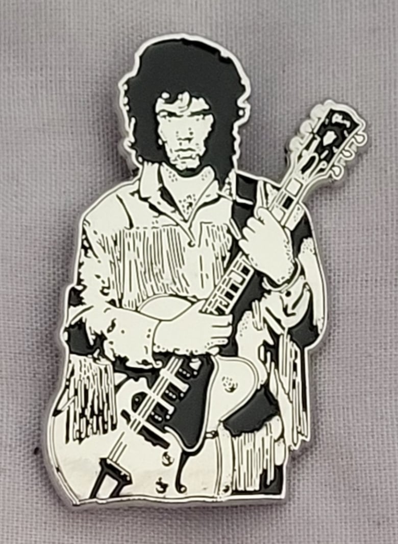 Image of Wild Frontier Tribute to Gary Moore limited edition shaped enamel pin. 