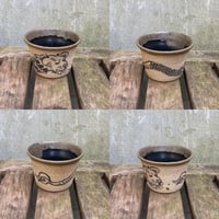 dog snake bowl