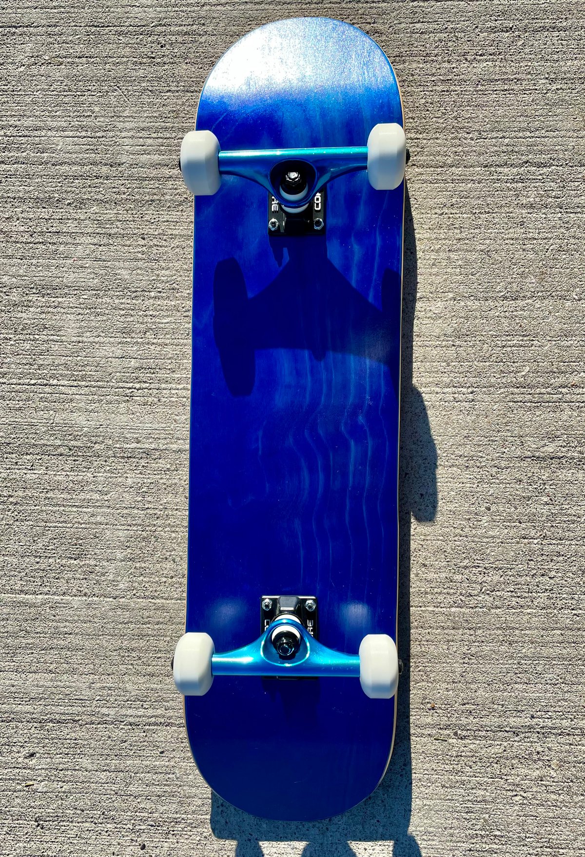 Image of Blue Stained Complete Skateboard w/ Metallic BlueTrucks