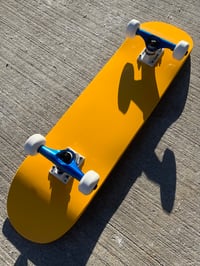 Image 3 of Yellow Complete Skateboard w/ Metallic Blue Trucks