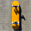 Yellow Complete Skateboard w/ Metallic Blue Trucks