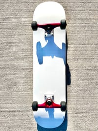 Image 2 of White Complete Skateboard w/ Metallic Red Trucks