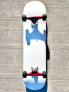White Complete Skateboard w/ Metallic Red Trucks
