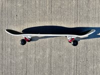 Image 5 of White Complete Skateboard w/ Metallic Red Trucks