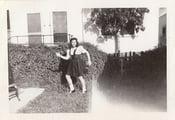 Image of VINTAGE PHOTO WOMAN IN YARD TAP DANCE POSE 1942