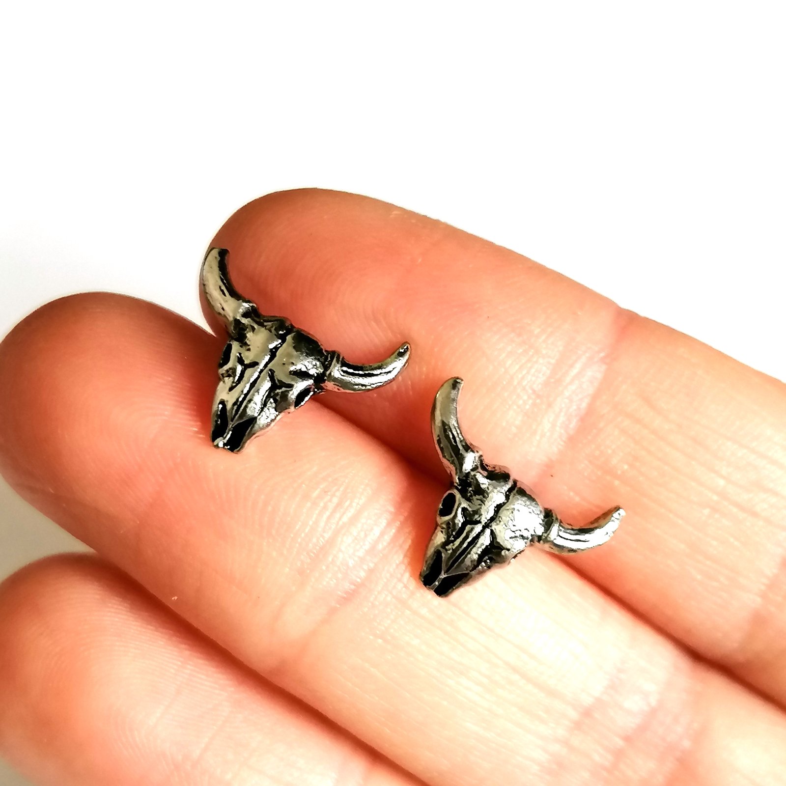 Cow store skull earrings