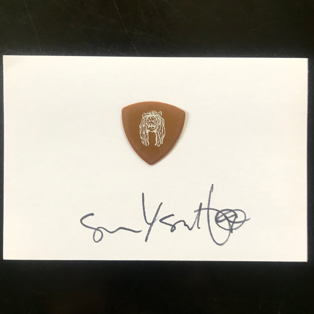 Rare vintage brown pick with signature