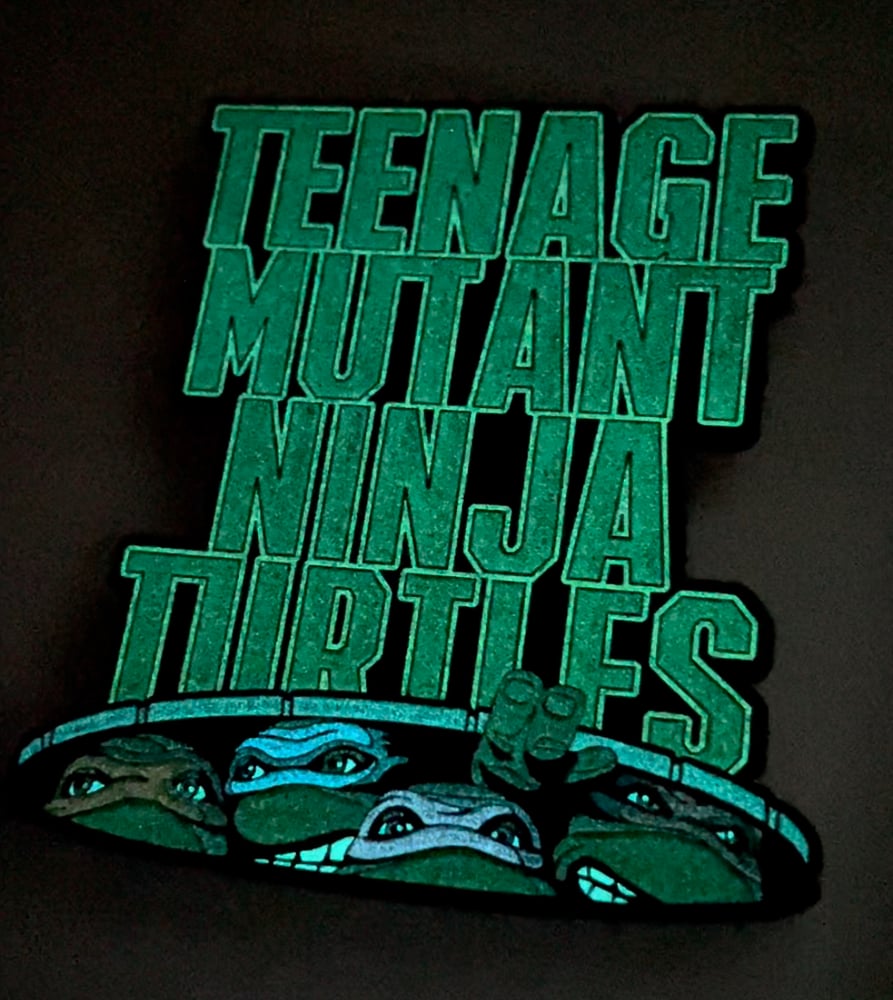 Image of GID 3” Giant Ultimate 90’s Movie Pin