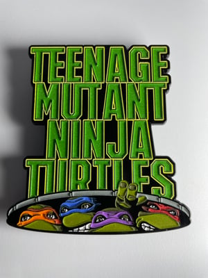 Image of GID 3” Giant Ultimate 90’s Movie Pin