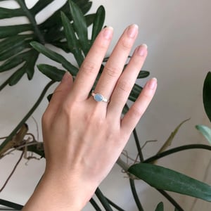 Image of Icy Blue Aquamarine oval cut flat band silver ring