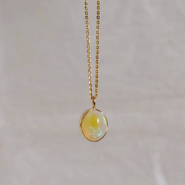 Image of Fire Opal cabochon oval shape 14k gold necklace